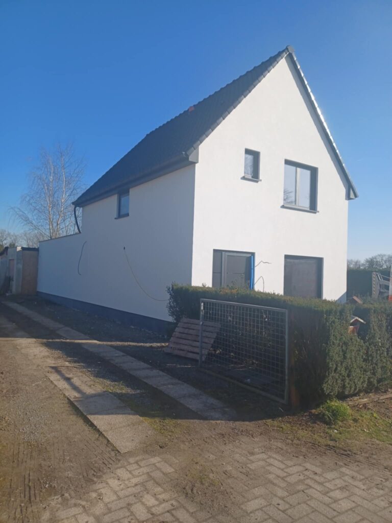 Gevelisolatie met afwerking crepi te Eeklo.